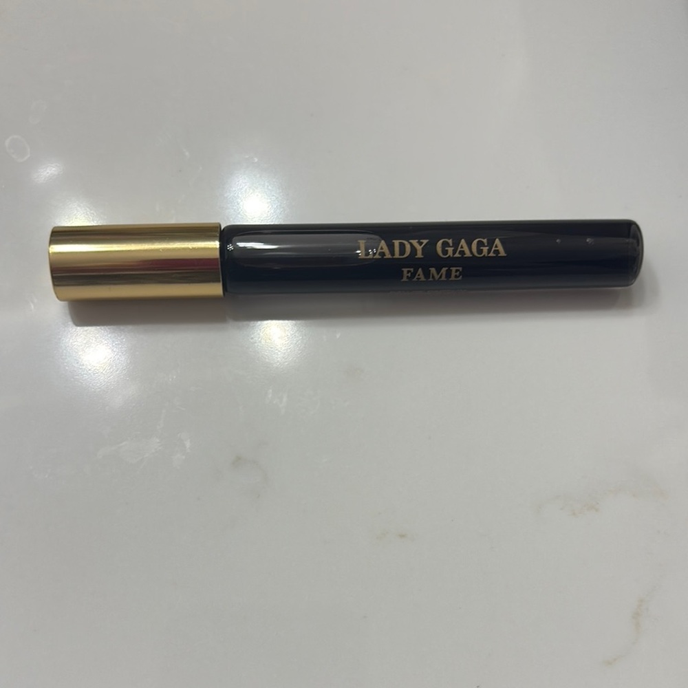 Discontinued!! 
Lady Gaga Fame Black and Gold Perfume Roller